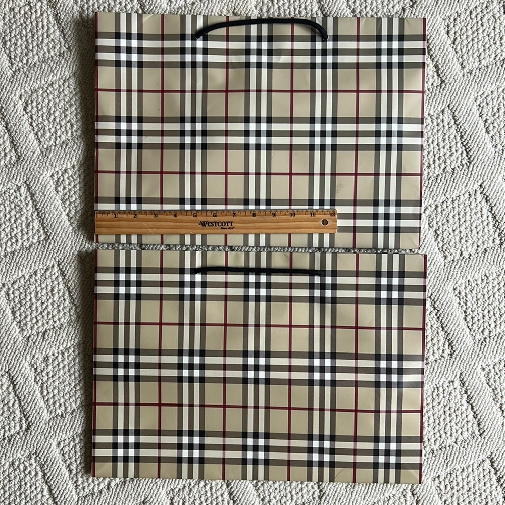 Burberry paper shopping bags.